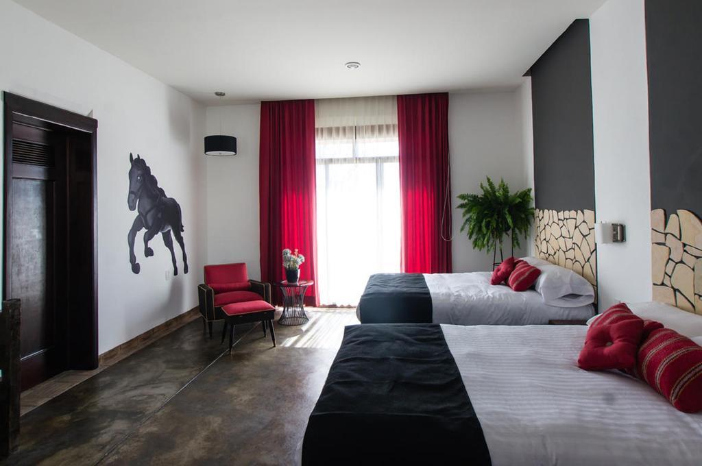 Hotel Casa Delina โกมิตัน เด โดมิงเกซ ห้อง รูปภาพ